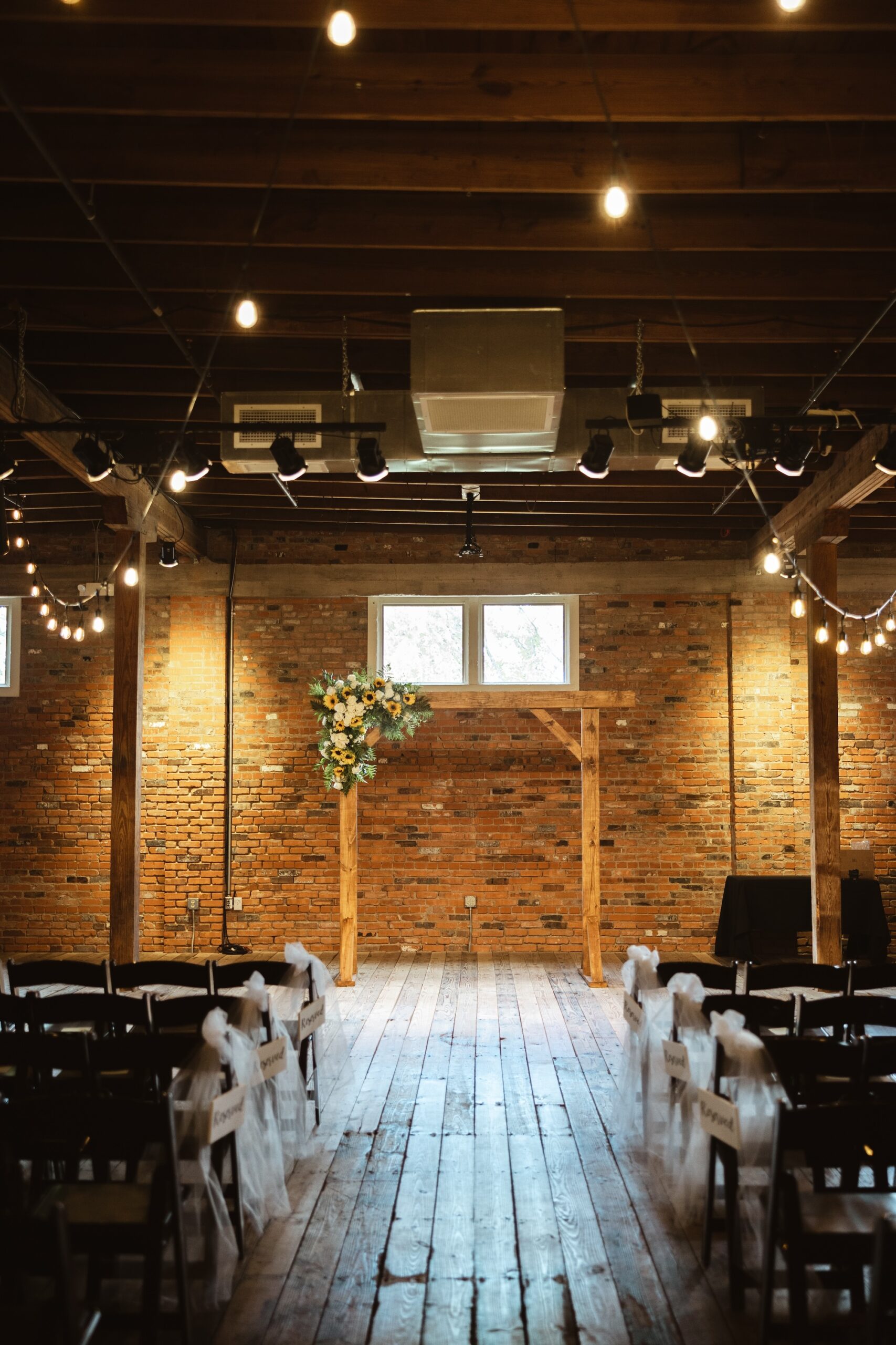 intimate wedding ceremonies with plenty of space for the reception at ice house on main in bryan college station, tx